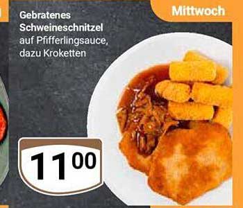 Gebratenes Schnitzel auf Pfeffersauce, dazu Kroketten