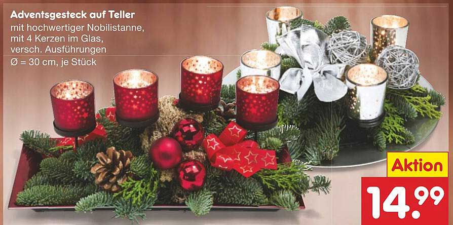 Adventsgesteck auf Teller